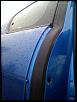 A hole drilled in my passenger side suicide door . . .-photo1.jpg