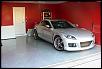 Updated pics of greddy turbo, racing brake rotors, engine bay, etc.-garage.jpg