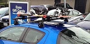 Yakima roof rack crossbar with ski/snowboard attachment-27072726_10160123102815554_8977981992821497956_n.jpg