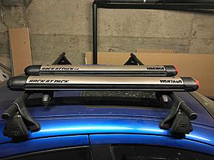 Yakima roof rack crossbar with ski/snowboard attachment-27140900_10160128824055554_1122868657_o.jpg
