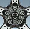 Black chrome wheels  from mazda-04_rx8_wheelcentercaprotary.jpg